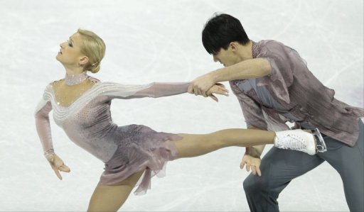 Tatiana Volosozhar and Maxim Trankov of Russia compete, March 15, 2013 in Canada Tatiana Volosozhar and Maxim Trankov of Russia compete, March 15, 2013 in Canada