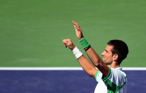 Novak Djokovic celebrates his victory over Jo-Wilfried Tsonga, in Indian Wells, California, on March 15, 2013 Novak Djokovic celebrates his victory over Jo-Wilfried Tsonga, in Indian Wells, California, on March 15, 2013