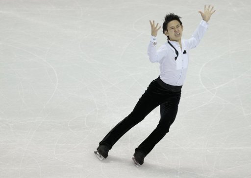 Denis Ten skates his men's free skate program, in London, Ontario, on March 15, 2013 Denis Ten skates his men's free skate program, in London, Ontario, on March 15, 2013
