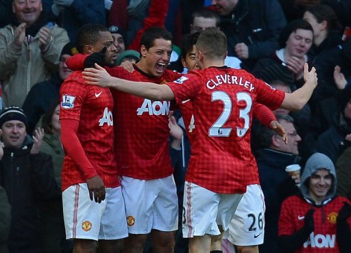 Manchester United players celebrate a goal during the match against Chelsea in Manchester, March 10, 2013 Manchester United players celebrate a goal during the match against Chelsea in Manchester, March 10, 2013
