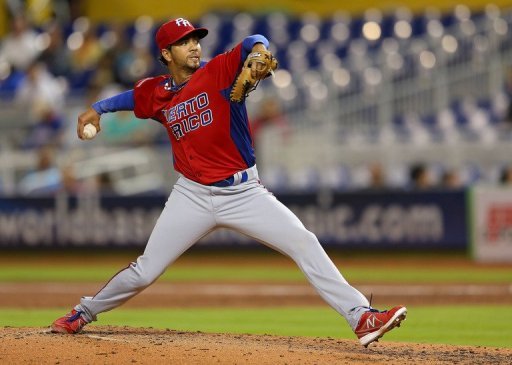 Nelson Figueroa of Puerto Rico pitches against the United States, in Miami, Florida, on March 15, 2013 Nelson Figueroa of Puerto Rico pitches against the United States, in Miami, Florida, on March 15, 2013