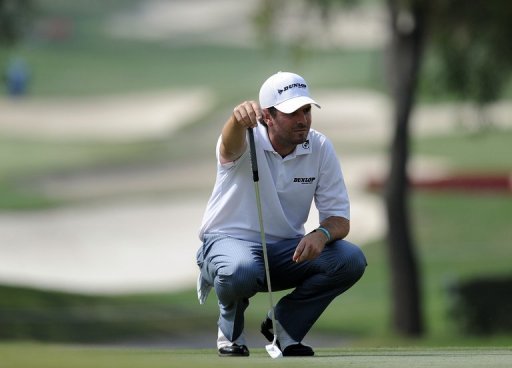 Thomas Aiken lines a putt during the Avantha Masters golf tournament near New Delhi on March 16, 2013 Thomas Aiken lines a putt during the Avantha Masters golf tournament near New Delhi on March 16, 2013