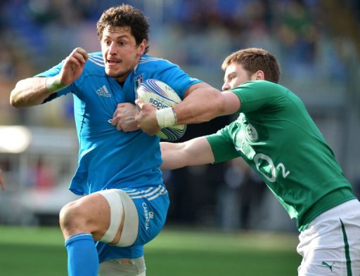 Italy's flanker Alessandro Zanni is tackled by Ireland's lock Iain Henderson (R) in Rome on March 16, 2013 Italy's flanker Alessandro Zanni is tackled by Ireland's lock Iain Henderson (R) in Rome on March 16, 2013