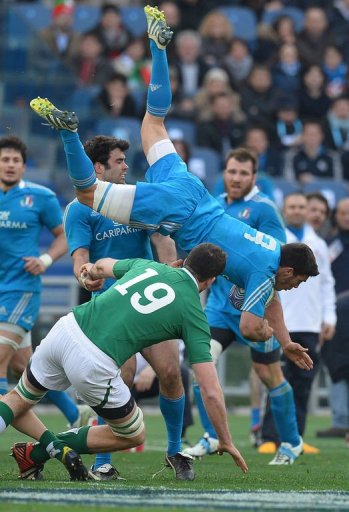 Italy's scrum-half Edoardo Gori (R) is tackled by Ireland's lock Devin Toner in Rome on March 16, 2013 Italy's scrum-half Edoardo Gori (R) is tackled by Ireland's lock Devin Toner in Rome on March 16, 2013
