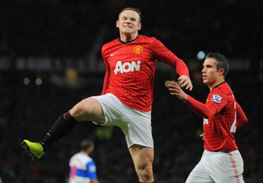 Manchester United's forward Wayne Rooney (L) celebrates after scoring at Old Trafford in Manchester, March 16, 2013 Manchester United's forward Wayne Rooney (L) celebrates after scoring at Old Trafford in Manchester, March 16, 2013