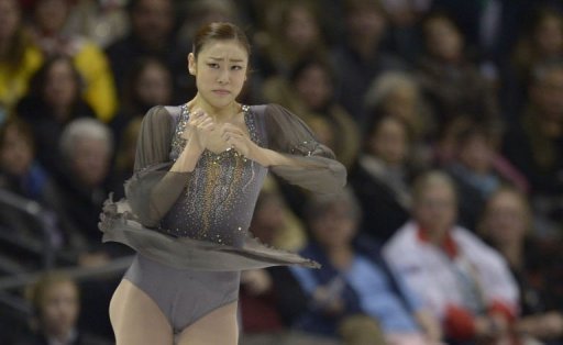 Kim Yu-Na performs during the women's free skating event at the World Figure Skating Championships on March 16, 2013 Kim Yu-Na performs during the women's free skating event at the World Figure Skating Championships on March 16, 2013