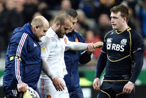 Frederic Michalak (centre) leaves the pitch during the match against Scotland in Saint-Denis on March 16, 2013 Frederic Michalak (centre) leaves the pitch during the match against Scotland in Saint-Denis on March 16, 2013