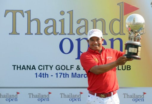 Prayad Marksaeng poses with the winner's trophy after the final round of the Thailand Open in Bangkok on March 17, 2013 Prayad Marksaeng poses with the winner's trophy after the final round of the Thailand Open in Bangkok on March 17, 2013
