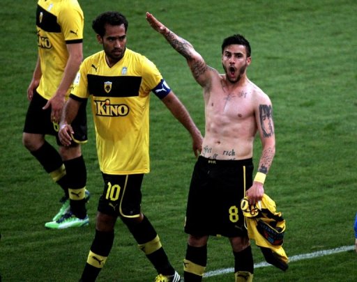 This picture taken on March 16, 2013 shows Giorgos Katidis celebrating a goal with a Nazi salute in Athens This picture taken on March 16, 2013 shows Giorgos Katidis celebrating a goal with a Nazi salute in Athens