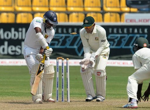 Sri Lanka's Rangana Herath (left) is dismissed during the second Test against Bangladesh in Colombo, on March 18, 2013 Sri Lanka's Rangana Herath (left) is dismissed during the second Test against Bangladesh in Colombo, on March 18, 2013
