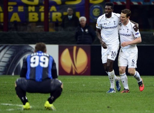 Tottenham Hotspur's Emmanuel Adebayor (C) celebrates after scoring during on March 14, 2013 at the San Siro Tottenham Hotspur's Emmanuel Adebayor (C) celebrates after scoring during on March 14, 2013 at the San Siro