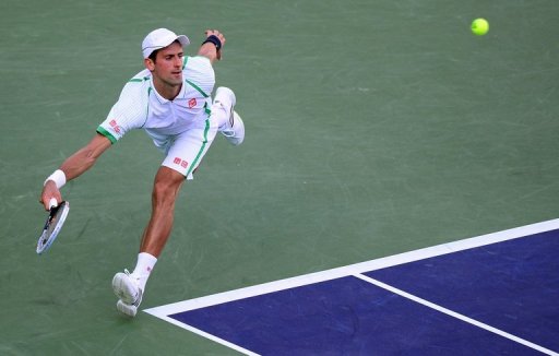 Novak Djokovic hits a forehand return during his defeat to Juan Martin del Potro on March 16, 2013 at Indian Wells Novak Djokovic hits a forehand return during his defeat to Juan Martin del Potro on March 16, 2013 at Indian Wells