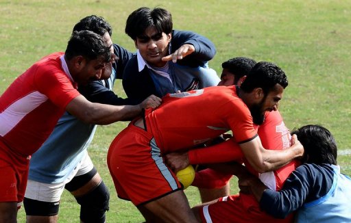 Local Pakistani rugby players fight for the ball during a match between the Army and the Lahore team, February 24, 2013 Local Pakistani rugby players fight for the ball during a match between the Army and the Lahore team, February 24, 2013