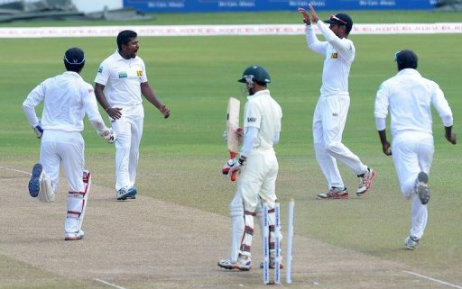 Rangana Herath (2nd left) celebrates with teammates after dismissing Nasir Hossain (centre) in Colombo on March 19, 2013 Rangana Herath (2nd left) celebrates with teammates after dismissing Nasir Hossain (centre) in Colombo on March 19, 2013
