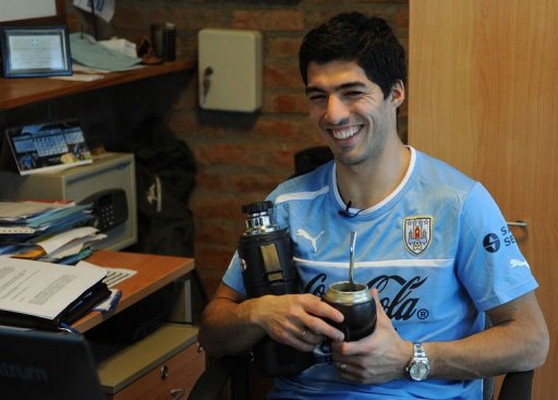 Luis Suarez smiles during an interview with AFP after a training session on March 19, 2013, in Montevideo Luis Suarez smiles during an interview with AFP after a training session on March 19, 2013, in Montevideo