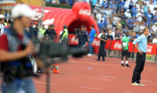 US coach Jurgen Klinsmann cuts a solitary figure during the World Cup qualifier at Honduras on February 6, 2013 US coach Jurgen Klinsmann cuts a solitary figure during the World Cup qualifier at Honduras on February 6, 2013
