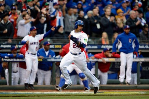Robinson Cano of the Dominican Republic scores on a two-run RBI double hit by Edwin Encarnacion on March 19, 2013 Robinson Cano of the Dominican Republic scores on a two-run RBI double hit by Edwin Encarnacion on March 19, 2013