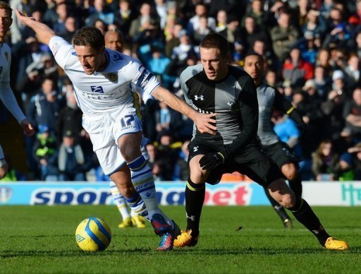 Leeds midfielder Michael Brown (L) escapes from Tottenham's Gylfi Sigurdsson during the FA Cup match, January 27, 2013 Leeds midfielder Michael Brown (L) escapes from Tottenham's Gylfi Sigurdsson during the FA Cup match, January 27, 2013