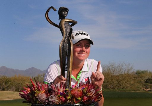 Stacy Lewis poses with the trophy after winning the the RR Donnelley LPGA Founders Cup on March 17, 2013 in Phoenix Stacy Lewis poses with the trophy after winning the the RR Donnelley LPGA Founders Cup on March 17, 2013 in Phoenix