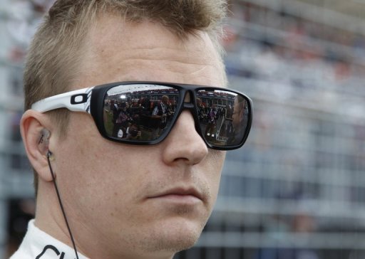 Kimi Raikkonen before the start of the Formula One Australian Grand Prix in Melbourne on March 17, 2013 Kimi Raikkonen before the start of the Formula One Australian Grand Prix in Melbourne on March 17, 2013