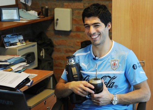 Luis Suarez smiles during an interview with AFP after a training session on March 19, 2013, in Montevideo Luis Suarez smiles during an interview with AFP after a training session on March 19, 2013, in Montevideo