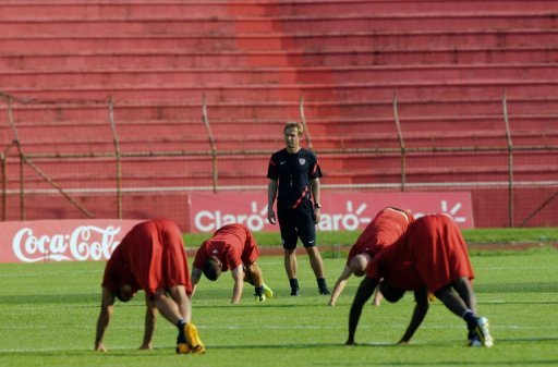 US football team coach Jurgen Klinsmann, looks at his players during a training session in Honduras, February 5, 2013 US football team coach Jurgen Klinsmann, looks at his players during a training session in Honduras, February 5, 2013