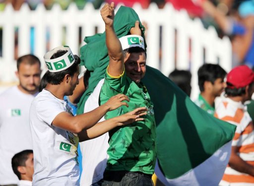 Pakistan fans celebrate at Sahara Stadium Kingsmead on March 21, 2013 in Durban Pakistan fans celebrate at Sahara Stadium Kingsmead on March 21, 2013 in Durban