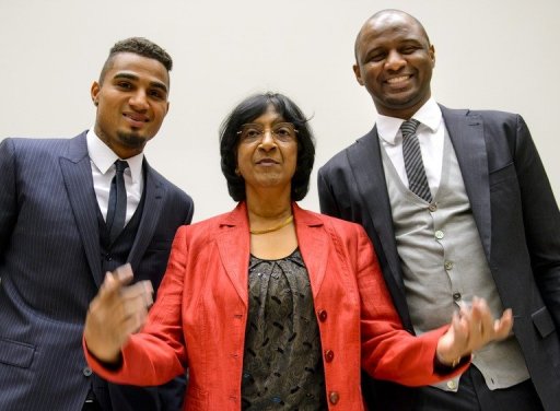 Kevin-Prince Boateng (L) and Patrick Vieira (R) pose with Navi Pillay on March 21, 2013 in Geneva Kevin-Prince Boateng (L) and Patrick Vieira (R) pose with Navi Pillay on March 21, 2013 in Geneva