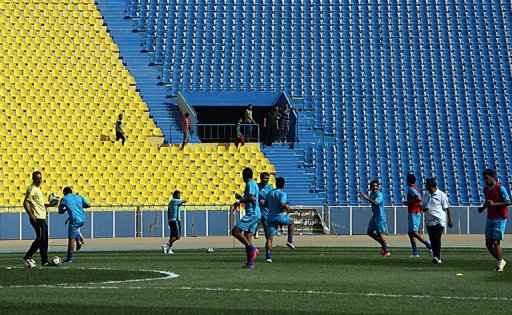 Iraqi footballers train at Baghdad's Al-Shaab Stadium on April 15, 2011 Iraqi footballers train at Baghdad's Al-Shaab Stadium on April 15, 2011