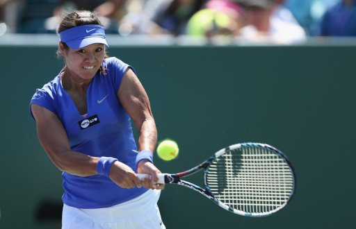 Li Na of China plays a backhand to Kiki Bertens of Netherlands, March 21, 2013 in Key Biscayne, Florida Li Na of China plays a backhand to Kiki Bertens of Netherlands, March 21, 2013 in Key Biscayne, Florida
