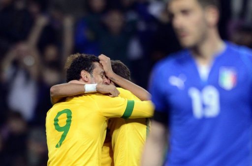 Brazilian midfielder Fred (L) celebrates after scoring during the FIFA World Cup exhibition match on March 21, 2013 Brazilian midfielder Fred (L) celebrates after scoring during the FIFA World Cup exhibition match on March 21, 2013