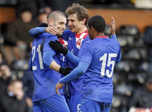 Croatian players celebrate scoring a goal during match against South Korea in London on February 6, 2013 Croatian players celebrate scoring a goal during match against South Korea in London on February 6, 2013