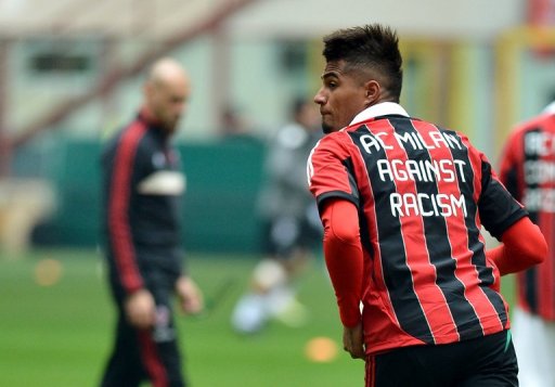 AC Milan's Ghanaian defender Prince Kevin Boateng warms upbefore the match against Siena on January 6 , 2013, in Milan AC Milan's Ghanaian defender Prince Kevin Boateng warms upbefore the match against Siena on January 6 , 2013, in Milan