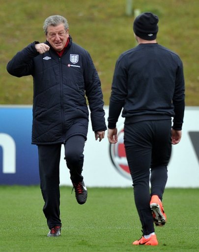 England manager Roy Hodgson (L) and striker Wayne Rooney (R) attend training in Burton-upon-Trent, March 19, 2013 England manager Roy Hodgson (L) and striker Wayne Rooney (R) attend training in Burton-upon-Trent, March 19, 2013