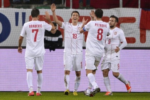 Filip Duricic (centre) celebrates Serbia's third goal against Chile in St Gallen on November 14, 2012 Filip Duricic (centre) celebrates Serbia's third goal against Chile in St Gallen on November 14, 2012