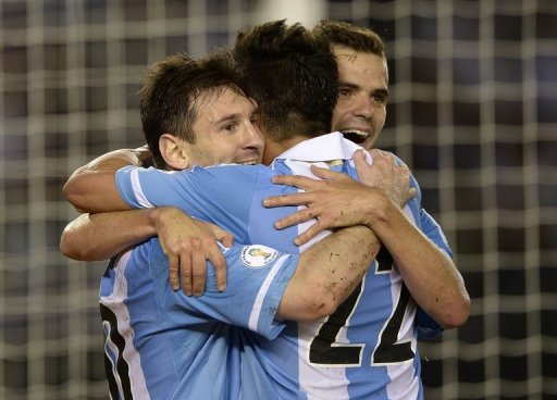 Argentina's players celebrate after scoring a penalty against Venezuela, in Buenos Aires, on March 22, 2013 Argentina's players celebrate after scoring a penalty against Venezuela, in Buenos Aires, on March 22, 2013