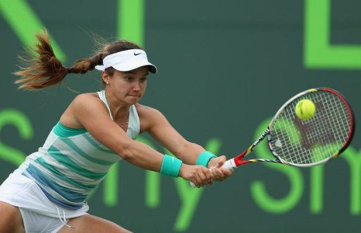 Lauren Davis plays a backhand to Madison Keys at Crandon Park Tennis Center on March 22, 2013 Lauren Davis plays a backhand to Madison Keys at Crandon Park Tennis Center on March 22, 2013