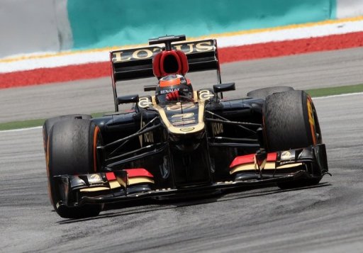 Lotus driver Kimi Raikkonen was hit by a three-place grid penalty at the Malaysian Grand Prix, Sepang, March 23, 2013 Lotus driver Kimi Raikkonen was hit by a three-place grid penalty at the Malaysian Grand Prix, Sepang, March 23, 2013