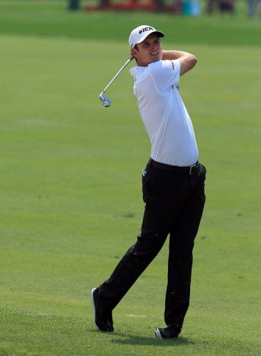 Justin Rose of England plays his second shot on the 1st hole at Bay Hill Golf and Country Club on March 23, 2013 Justin Rose of England plays his second shot on the 1st hole at Bay Hill Golf and Country Club on March 23, 2013