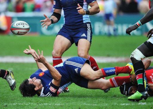 Kenya's Biko Adema (bottom-R) tackles France's Paul Albaladejo during the Hong Kong Rugby Sevens, on March 23, 2013 Kenya's Biko Adema (bottom-R) tackles France's Paul Albaladejo during the Hong Kong Rugby Sevens, on March 23, 2013