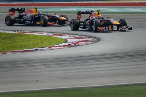 Red Bull driver Mark Webber of Australia (right) leads teammate Sebastian Vettel of Germany in Sepang on March 24, 2013 Red Bull driver Mark Webber of Australia (right) leads teammate Sebastian Vettel of Germany in Sepang on March 24, 2013