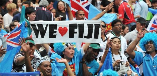 Fijian fans cheer as their team plays against New Zealand during the Hong Kong Rugby Sevens tournament on March 24, 201 Fijian fans cheer as their team plays against New Zealand during the Hong Kong Rugby Sevens tournament on March 24, 201