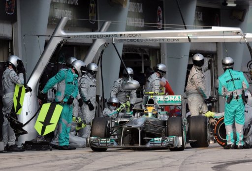 Mercedes driver Lewis Hamilton leaves after a pitstop during the Formula One Malaysian Grand Prix ,Sepang,March 24, 2013 Mercedes driver Lewis Hamilton leaves after a pitstop during the Formula One Malaysian Grand Prix ,Sepang,March 24, 2013