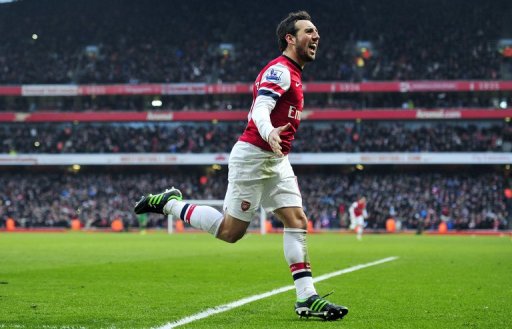 Arsenal's Santi Cazorla celebrates scoring at the Emirates Stadium in London on February 23, 2013 Arsenal's Santi Cazorla celebrates scoring at the Emirates Stadium in London on February 23, 2013