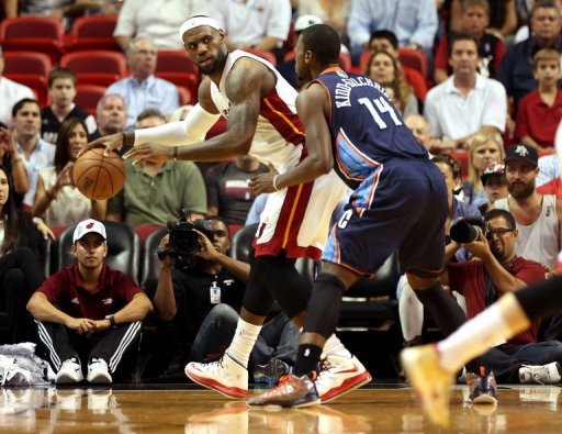 Miami's LeBron James (L) and Charlotte Bobcats' Michael Kidd-Gilchrist is pictured during their game on March 24, 2013 Miami's LeBron James (L) and Charlotte Bobcats' Michael Kidd-Gilchrist is pictured during their game on March 24, 2013