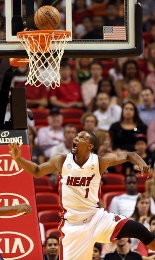 Miami Heat forward Chris Bosh shoots during their game against the Charlotte Bobcats on March 24, 2013 Miami Heat forward Chris Bosh shoots during their game against the Charlotte Bobcats on March 24, 2013