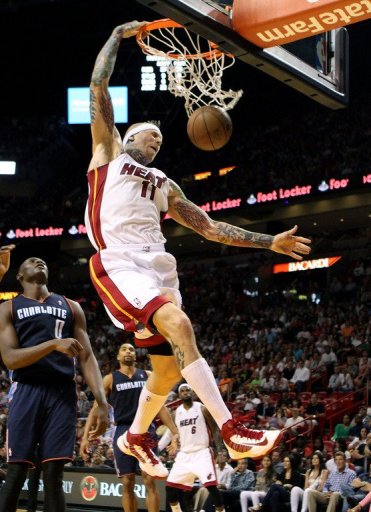 Miami Heat forward Chris Anderson dunks during their NBA game against the Charlotte Bobcats on March 24, 2013 Miami Heat forward Chris Anderson dunks during their NBA game against the Charlotte Bobcats on March 24, 2013