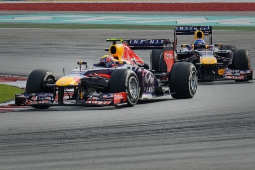 Red Bull driver Mark Webber (L) leads teammate Sebastian Vettel during the Malaysian Grand Prix on March 24, 2013 Red Bull driver Mark Webber (L) leads teammate Sebastian Vettel during the Malaysian Grand Prix on March 24, 2013