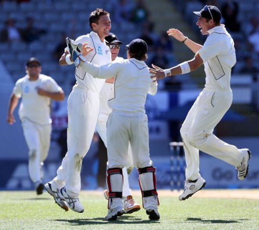 Trent Boult (second L) celebrates the wicket of Joe Root at Eden Park on March 26, 2013 Trent Boult (second L) celebrates the wicket of Joe Root at Eden Park on March 26, 2013