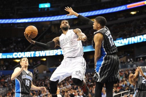 LeBron James shoots over Tobias Harris on March 25, 2013 LeBron James shoots over Tobias Harris on March 25, 2013